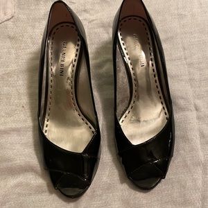 Black patten Gianna Bono wedges.